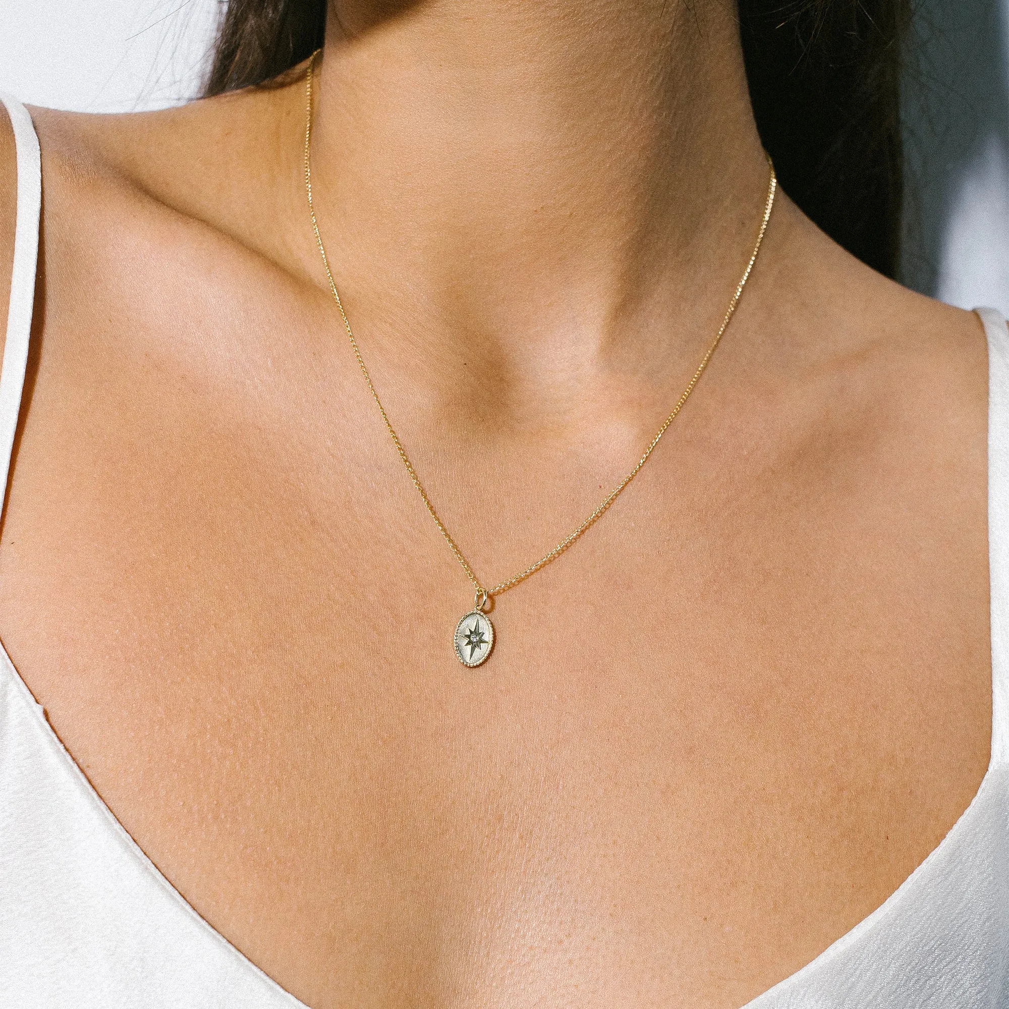 10K Gold Small Star Pendant with Diamond Detail