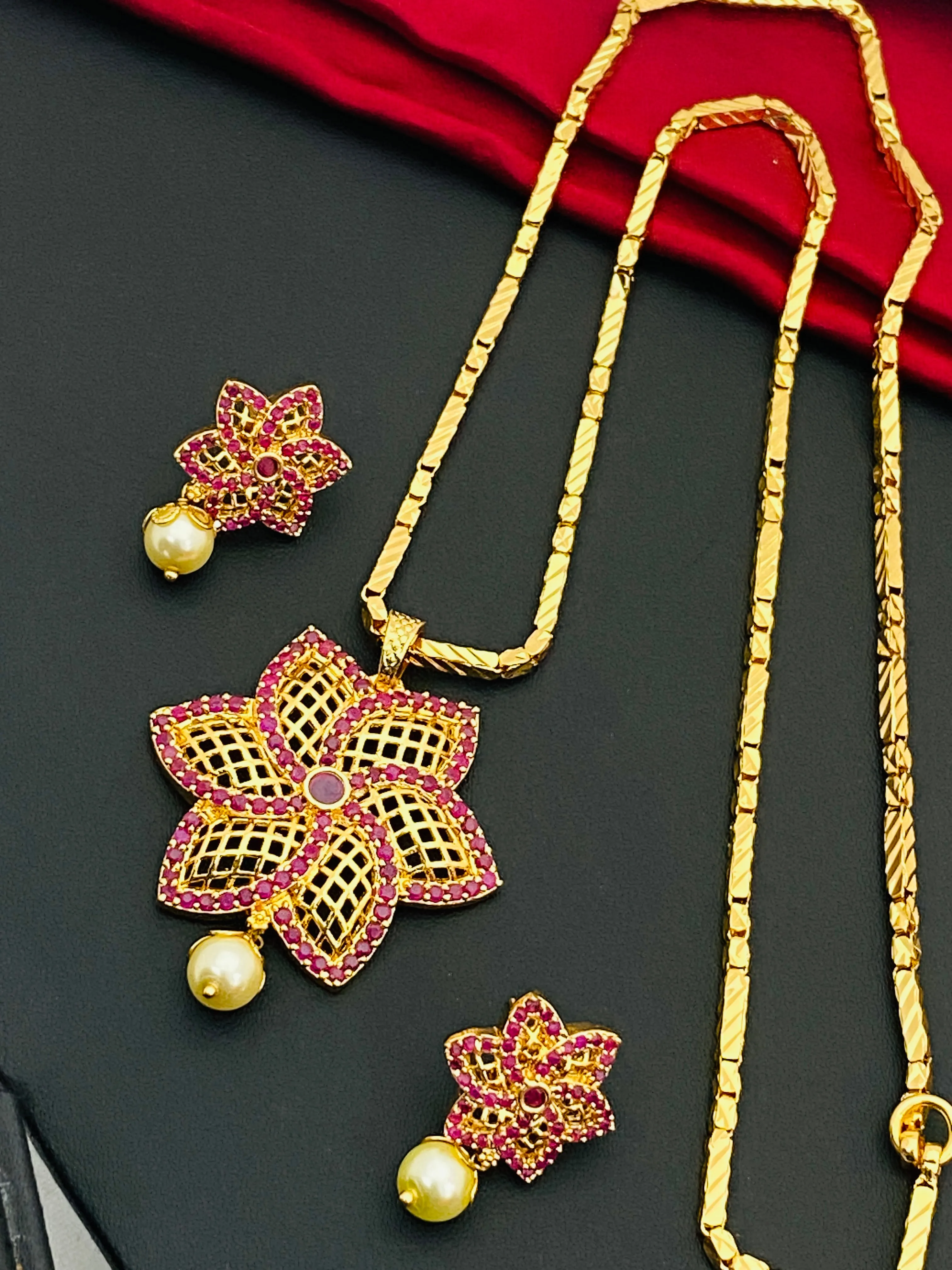Beautiful Ruby Color Stoned Gold Plated Necklace With Earring Sets