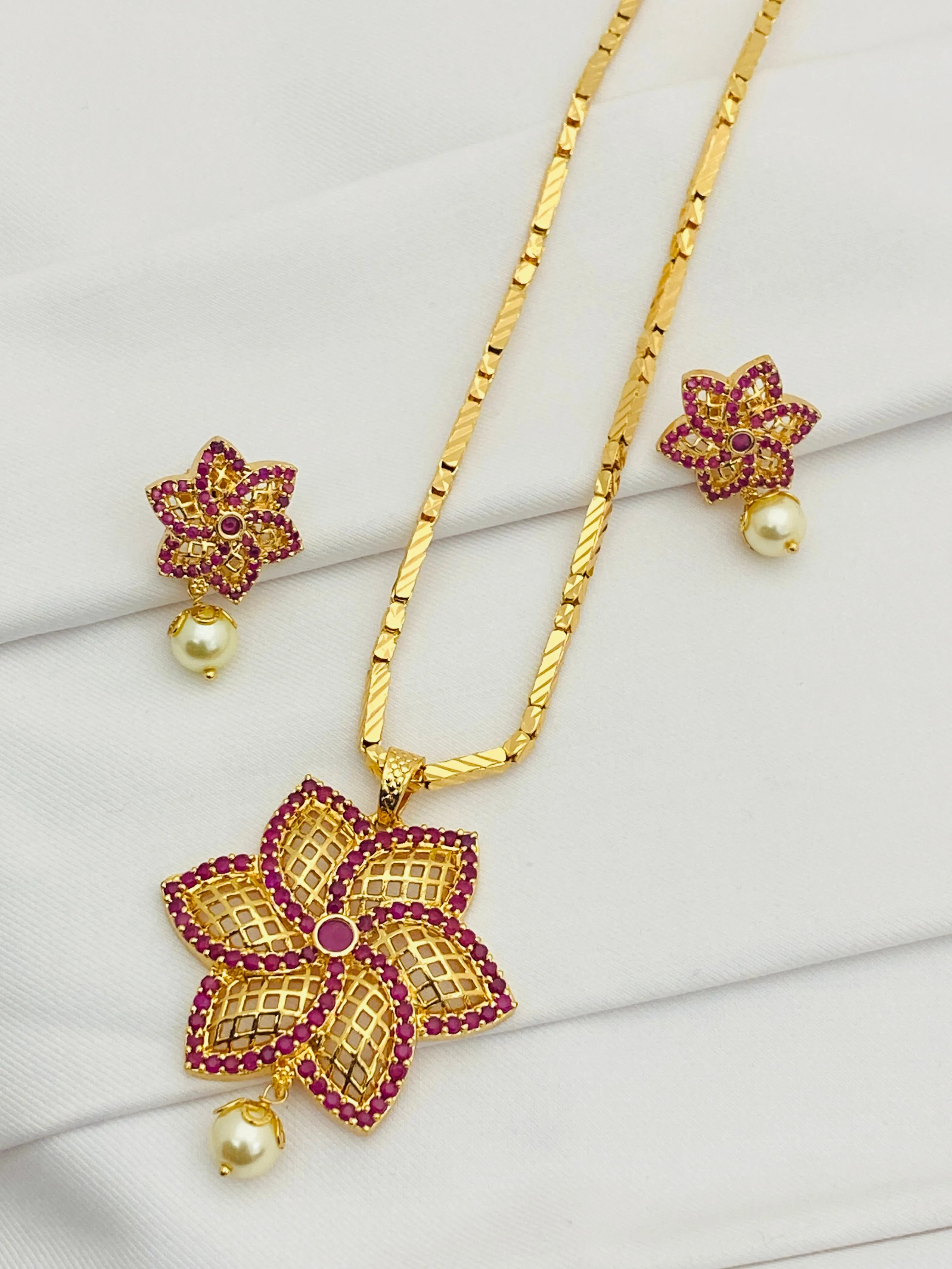 Beautiful Ruby Color Stoned Gold Plated Necklace With Earring Sets