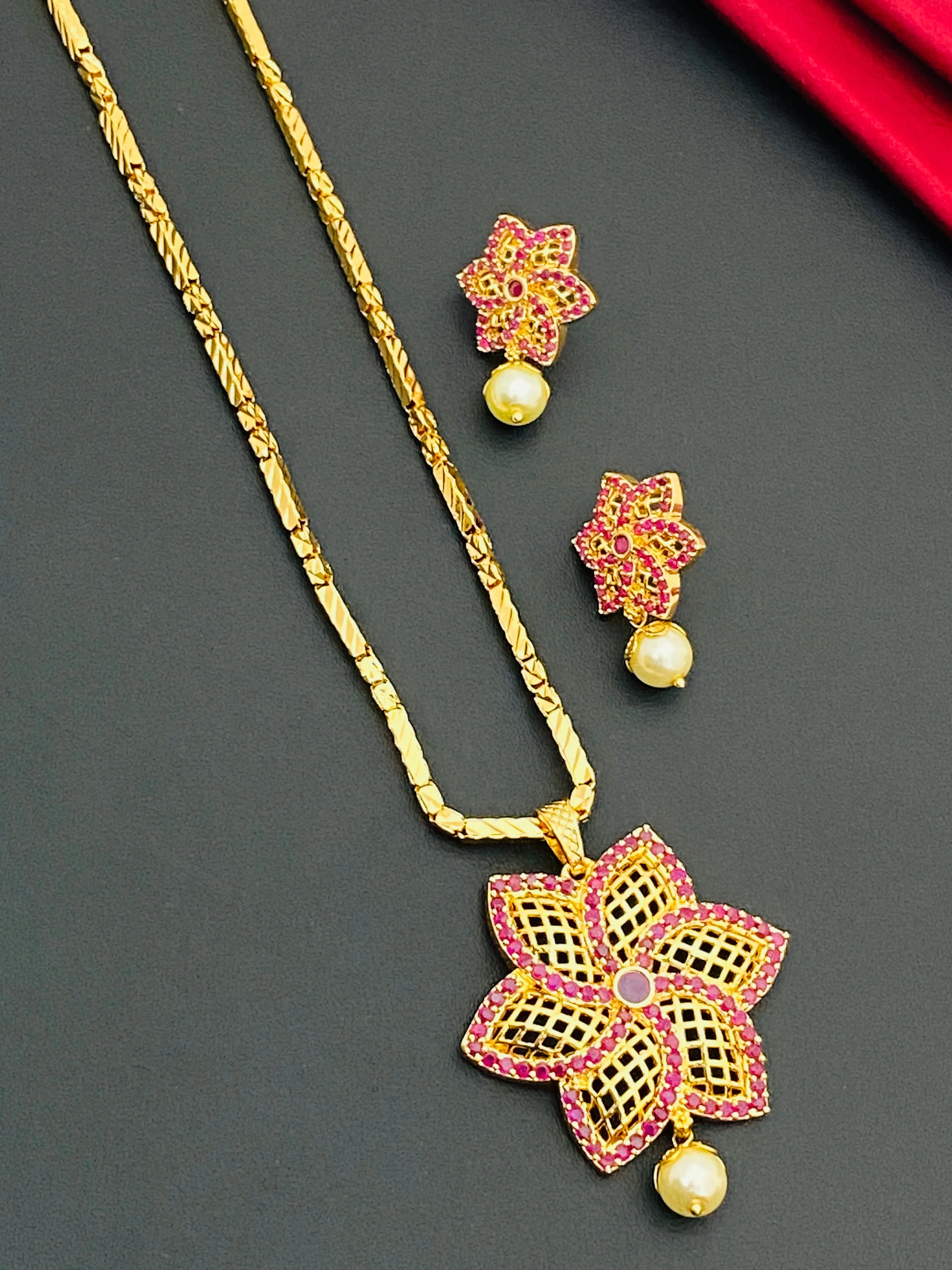 Beautiful Ruby Color Stoned Gold Plated Necklace With Earring Sets