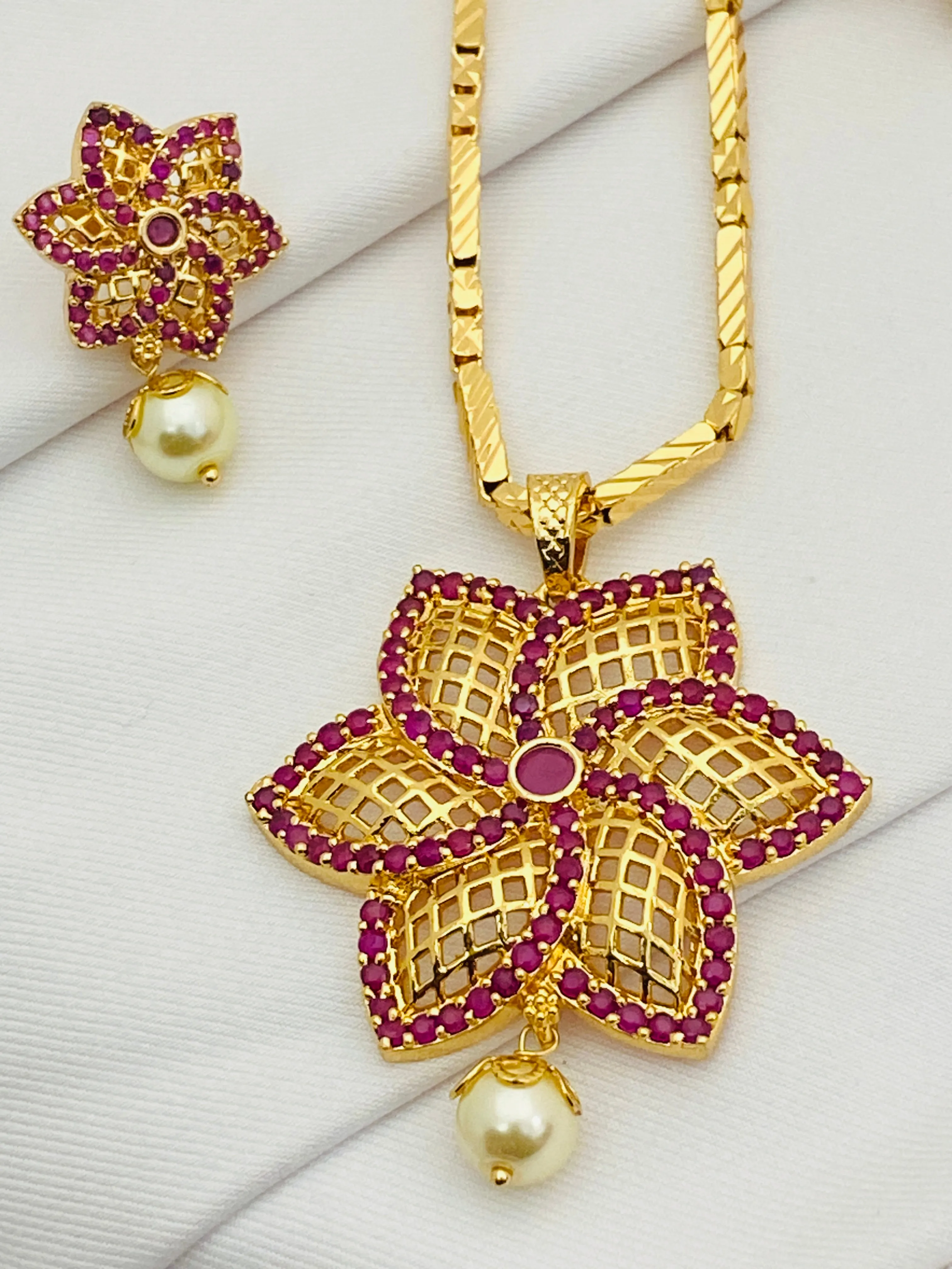 Beautiful Ruby Color Stoned Gold Plated Necklace With Earring Sets