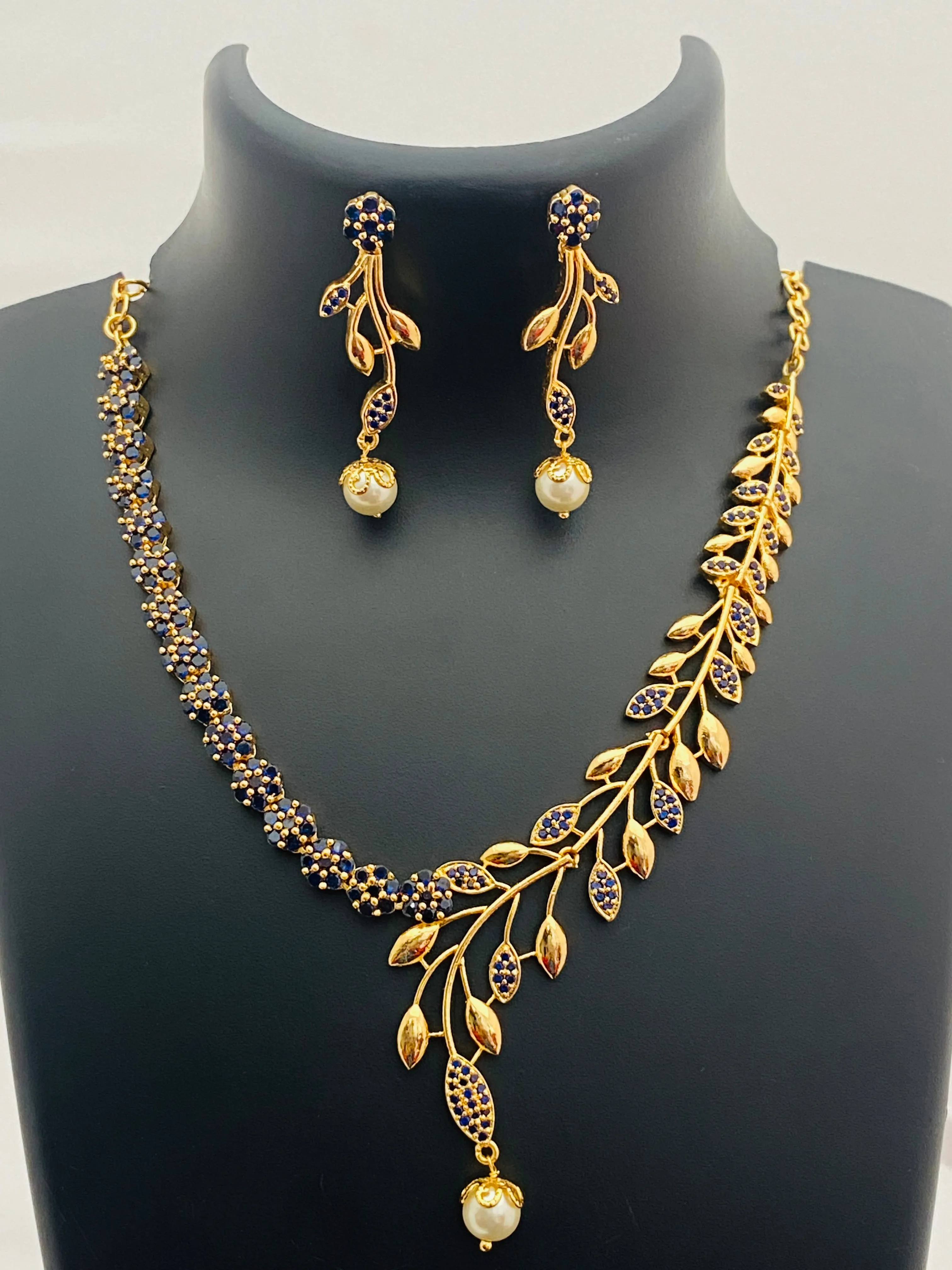 Stunning Blue Color Gold Plated AD Stoned Necklace With Earring Sets