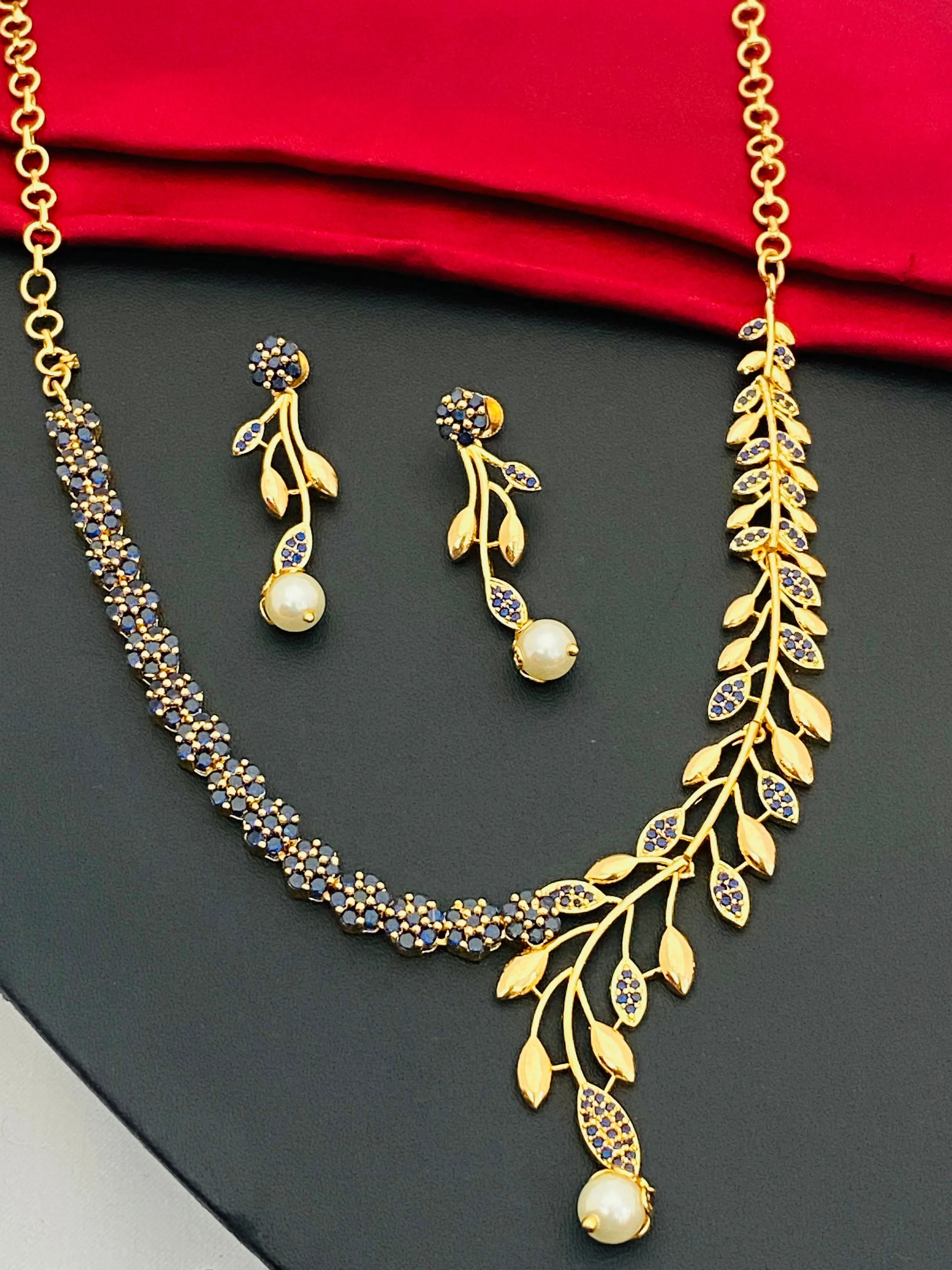 Stunning Blue Color Gold Plated AD Stoned Necklace With Earring Sets