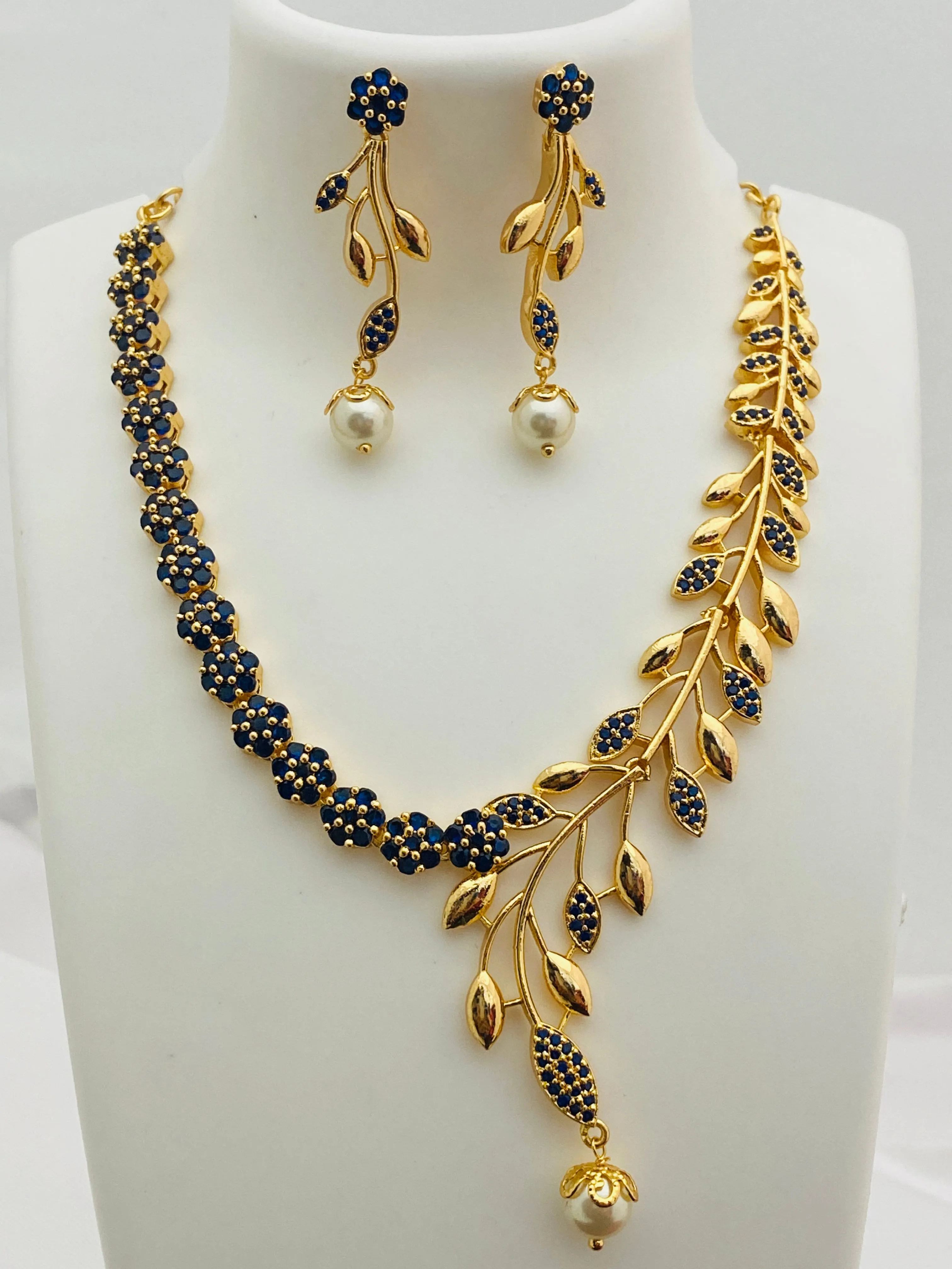 Stunning Blue Color Gold Plated AD Stoned Necklace With Earring Sets